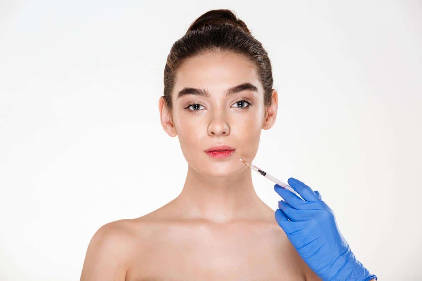 A person getting botox injection
AI-generated content may be incorrect.