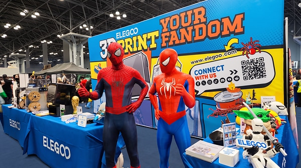A Spider-Man Cosplayer (left) stands alongside a 3D printed Spider-Man (right) A Spider-Man Cosplayer (left) stands alongside a 3D printed Spider-Man (right)